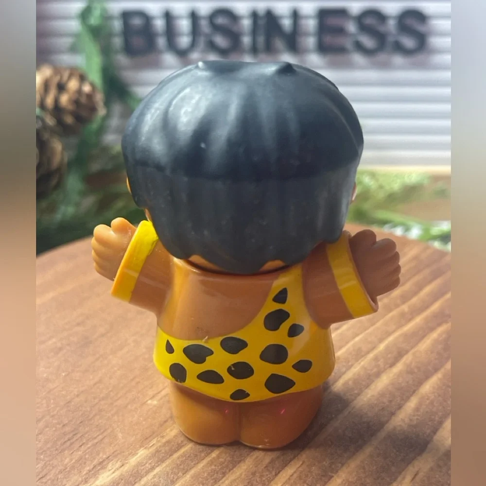 Caveman Toy Figure with Yellow and Black Outfit
